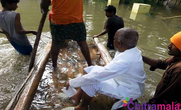Ilayaraja travels in a boat to visit the children