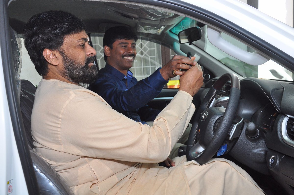 Suresh Kondeti With Chiranjeevi With His New Car Latest Photos