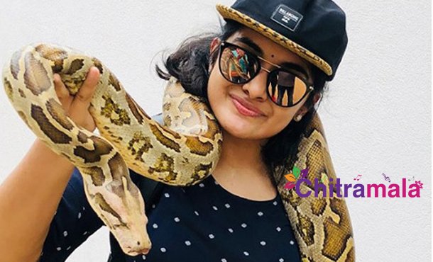 Nivetha Thomas with Snake